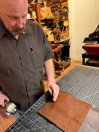 Leather  Book Cover with a book.  1984, Wind in The Willows, Dylan Thomas Poems or  Animal Farm