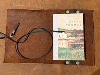 Leather  Book Cover with a book.  1984, Wind in The Willows, Dylan Thomas Poems or  Animal Farm