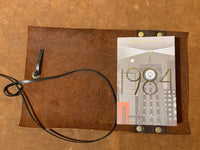 Leather  Book Cover with a book.  1984, Wind in The Willows, Dylan Thomas Poems or  Animal Farm