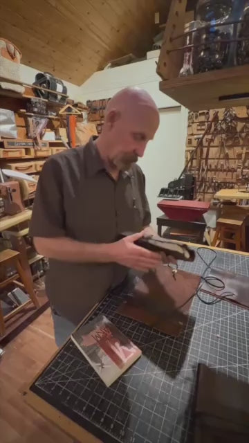 Leather  Book Cover with a book.  1984, Wind in The Willows, Dylan Thomas Poems or  Animal Farm