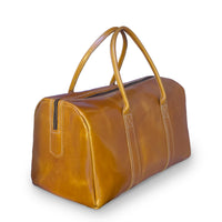 A brown leather duffel bag with dual top handles, a zippered top closure, and contrast stitching, shown on a plain white background.